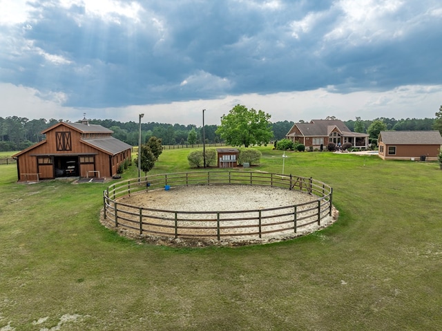 248 Gun Lake Loop, Tifton, GA 31794 - view of yard with a garage, an outdoor riding arena, an outbuilding, and a barn