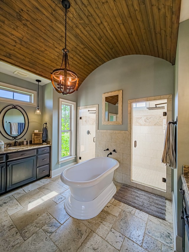 248 Gun Lake Loop, Tifton, GA 31794 - bathroom featuring vanity, stone tile floors, lofted ceiling, a stall shower, and wooden ceiling