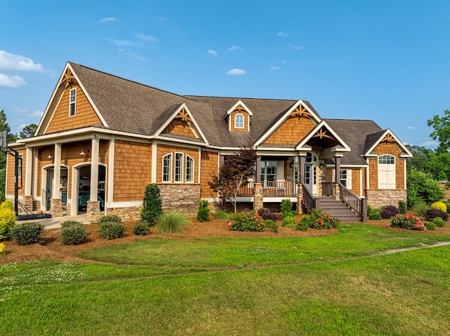 248 Gun Lake Loop, Tifton, GA 31794 - craftsman house with a porch, a front lawn, and stone siding