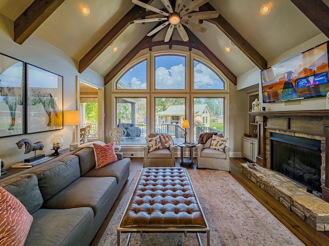 248 Gun Lake Loop, Tifton, GA 31794 - living room featuring beam ceiling, a ceiling fan, wood finished floors, high vaulted ceiling, and a fireplace