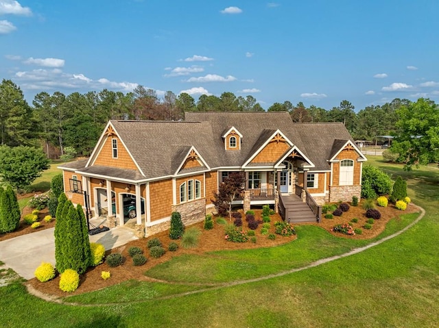 248 Gun Lake Loop, Tifton, GA 31794 - craftsman house with stone siding, a front lawn, and a porch