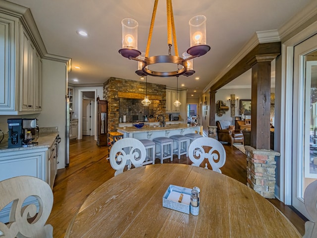 248 Gun Lake Loop, Tifton, GA 31794 - dining room with crown molding, dark wood-style flooring, a chandelier, and recessed lighting