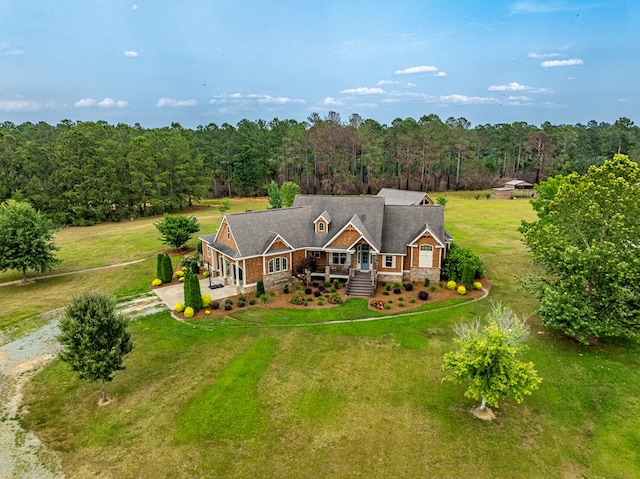 248 Gun Lake Loop, Tifton, GA 31794 - view of front of house featuring dirt driveway, a view of trees, and a front yard