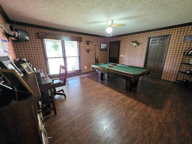 game room with a textured ceiling, ornamental molding, wood finished floors, billiards, and a ceiling fan
