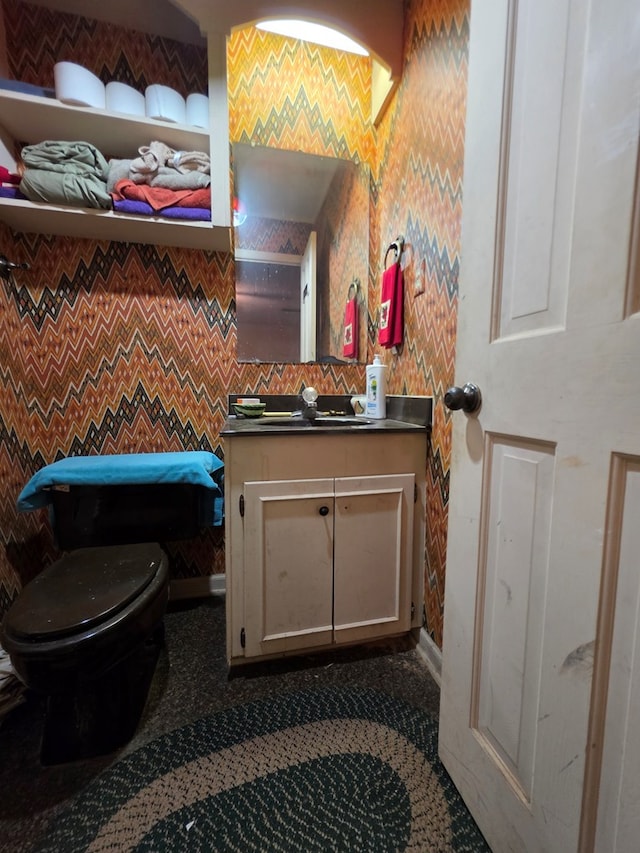 bathroom with vanity and toilet