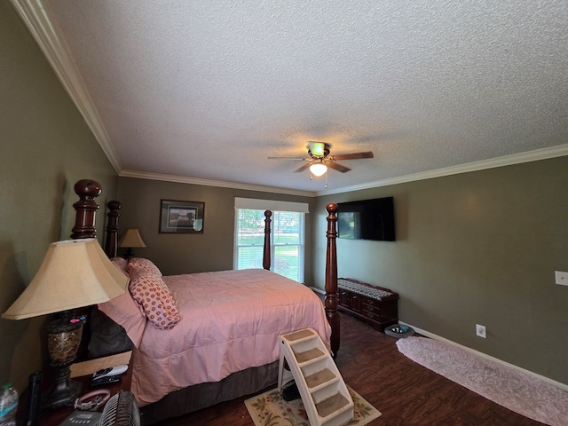 bedroom with a textured ceiling, wood finished floors, ornamental molding, baseboards, and a ceiling fan