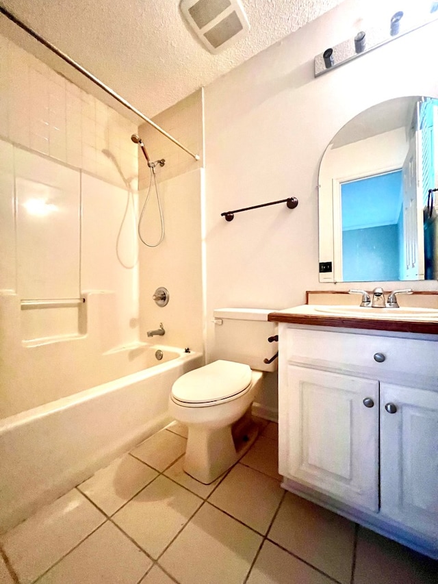 107 Riverview Loop, Fitzgerald, GA 31750 - full bath featuring tile patterned floors, a textured ceiling, toilet, shower / bathtub combination, and vanity