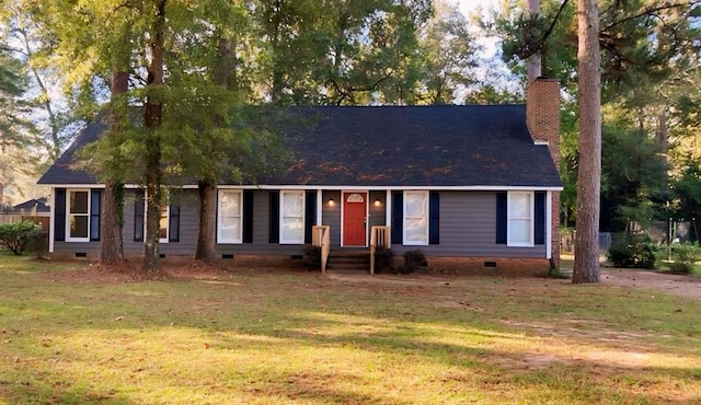 2211 Greenoch Ave, Albany, GA 31721 - view of front facade featuring crawl space, a chimney, and a front yard