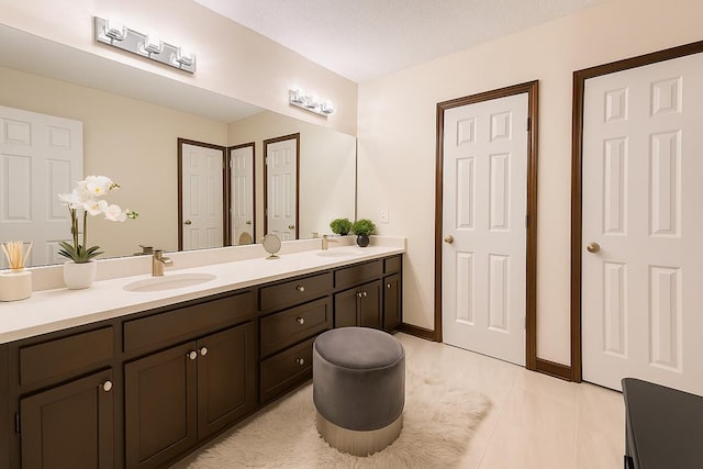 2211 Greenoch Ave, Albany, GA 31721 - bathroom with double vanity and tile patterned flooring