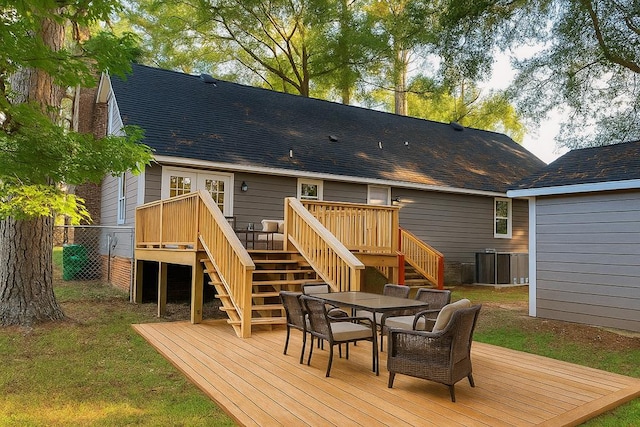 2211 Greenoch Ave, Albany, GA 31721 - wooden deck with stairway and outdoor dining space