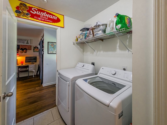 127 Carol Cir, Fitzgerald, GA 31750 - laundry room with washing machine and dryer and light tile patterned floors