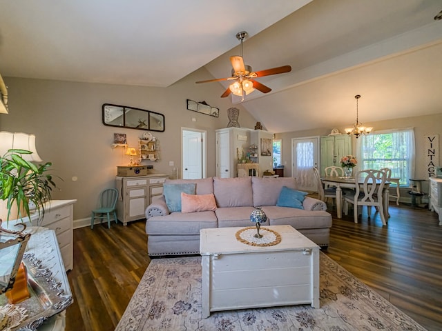 127 Carol Cir, Fitzgerald, GA 31750 - living room featuring wood finished floors, vaulted ceiling, a ceiling fan, and a chandelier