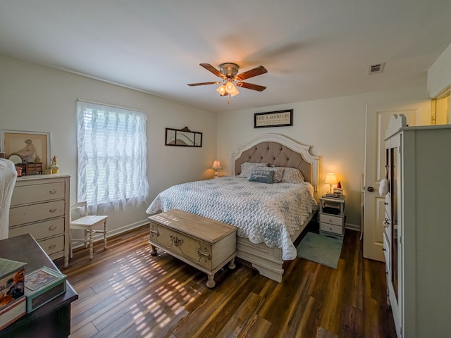 127 Carol Cir, Fitzgerald, GA 31750 - bedroom with dark wood finished floors and ceiling fan