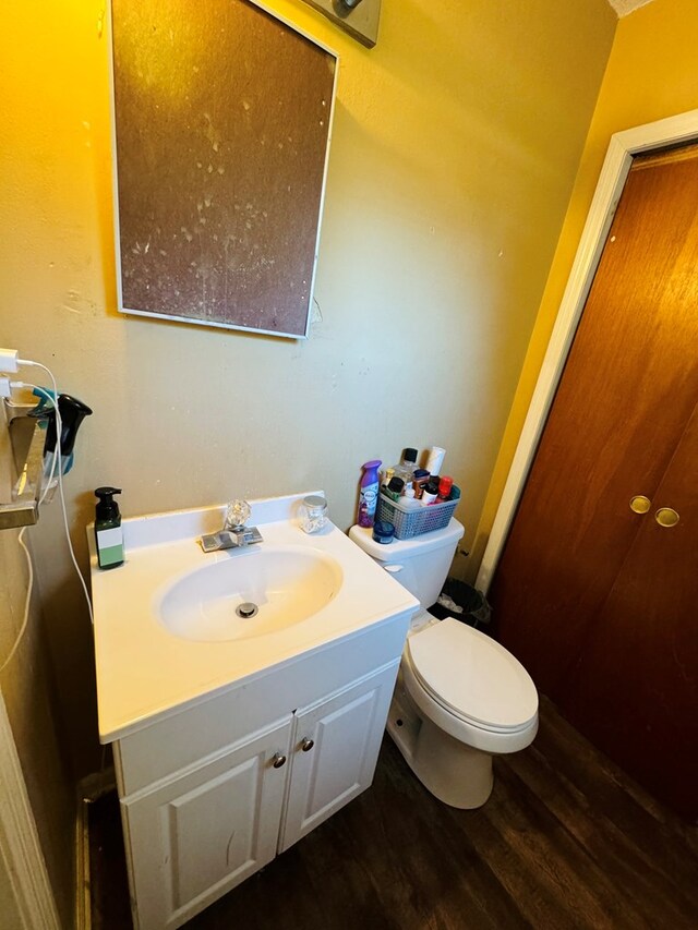 106 Pendley St, Sylvester, GA 31791 - bathroom featuring toilet, wood finished floors, and vanity