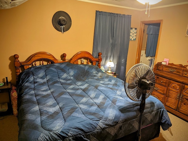 carpeted bedroom featuring ornamental molding
