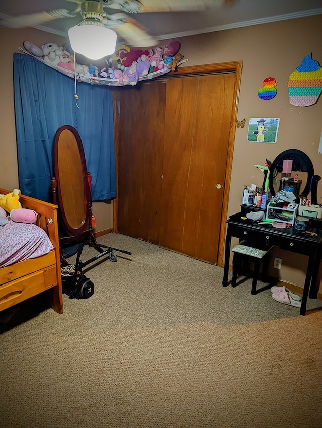 carpeted bedroom with ornamental molding
