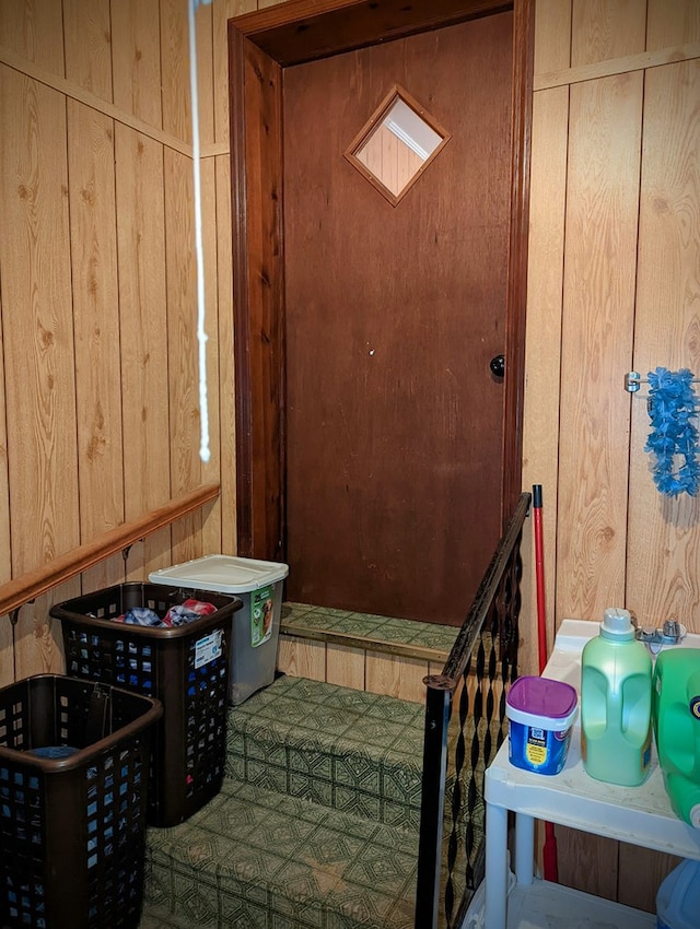 interior space featuring wooden walls