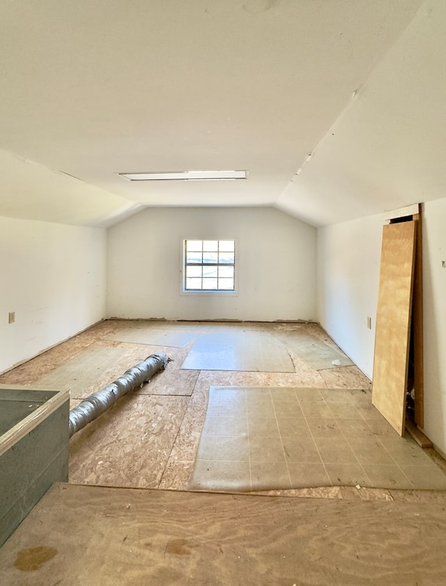 bonus room featuring lofted ceiling