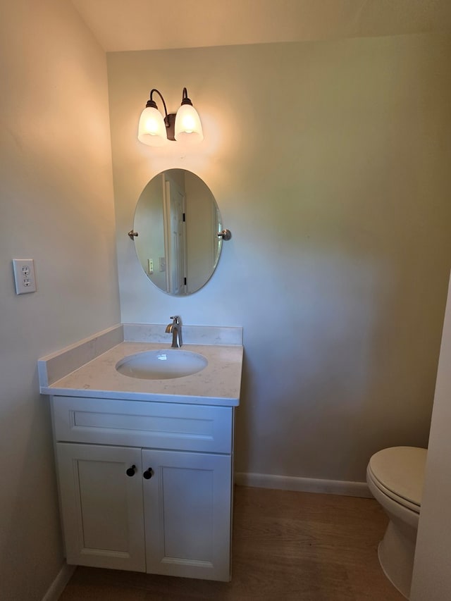 124 N Main St, Fitzgerald, GA 31750 - bathroom featuring toilet and vanity