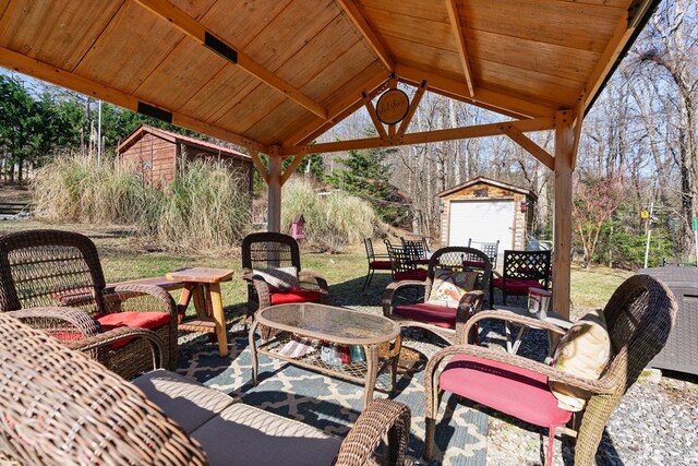 28 Bear Lovers Ct, Cleveland, GA 30528 - view of patio with an outbuilding and a storage unit