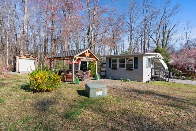 28 Bear Lovers Ct, Cleveland, GA 30528 - view of front of property with an outbuilding, a front lawn, and a gazebo