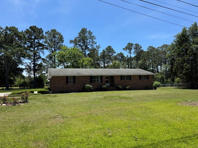 142 Elva Cir, Enigma, GA 31749 - single story home featuring brick siding, a front lawn, and entry steps