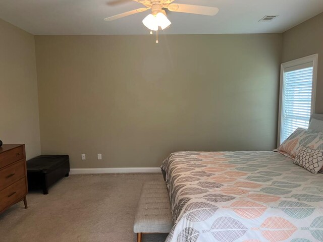 219 Cypress Ridge Rd, Tifton, GA 31794 - bedroom featuring light colored carpet, a ceiling fan, and baseboards