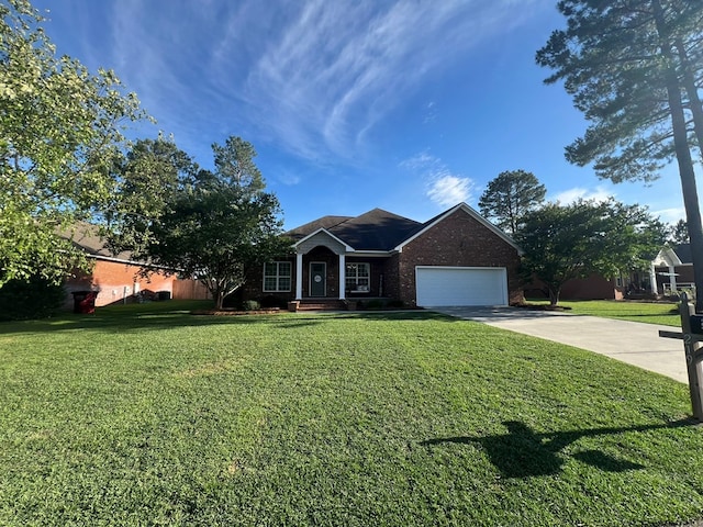 219 Cypress Ridge Rd, Tifton, GA 31794 - ranch-style home featuring brick siding, an attached garage, driveway, and a front yard