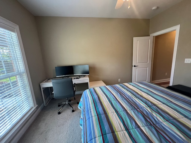 219 Cypress Ridge Rd, Tifton, GA 31794 - carpeted bedroom with a ceiling fan, baseboards, and a desk