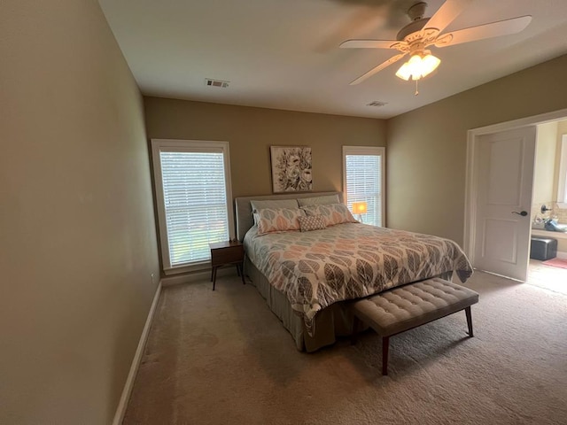 219 Cypress Ridge Rd, Tifton, GA 31794 - carpeted bedroom featuring baseboards, multiple windows, and ceiling fan