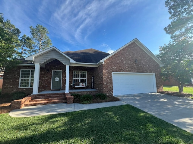 219 Cypress Ridge Rd, Tifton, GA 31794 - ranch-style home featuring brick siding, covered porch, a garage, concrete driveway, and a front yard