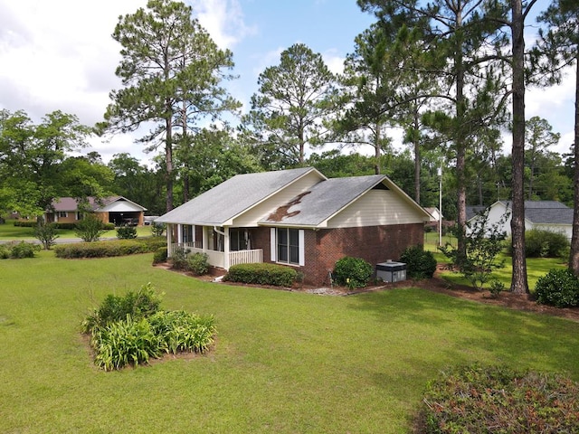 109 Preston Dr, Fitzgerald, GA 31750 - view of front of home with a front lawn and brick siding