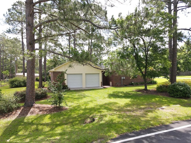 109 Preston Dr, Fitzgerald, GA 31750 - view of green lawn featuring an outbuilding