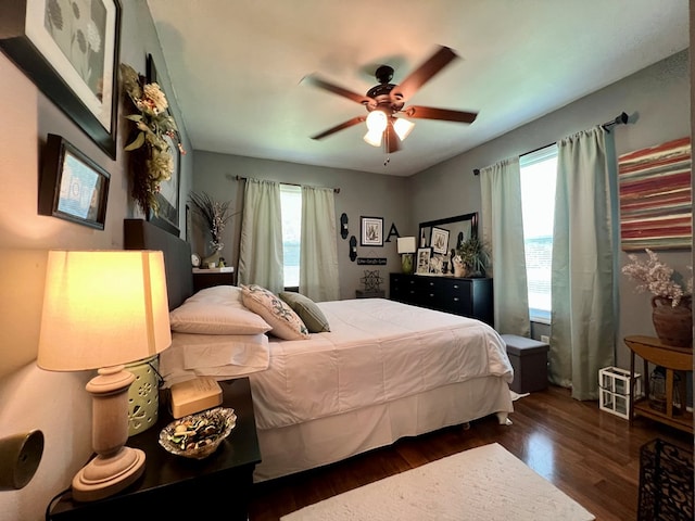 116 Branch Dr, Fitzgerald, GA 31750 - bedroom with multiple windows, wood finished floors, and ceiling fan
