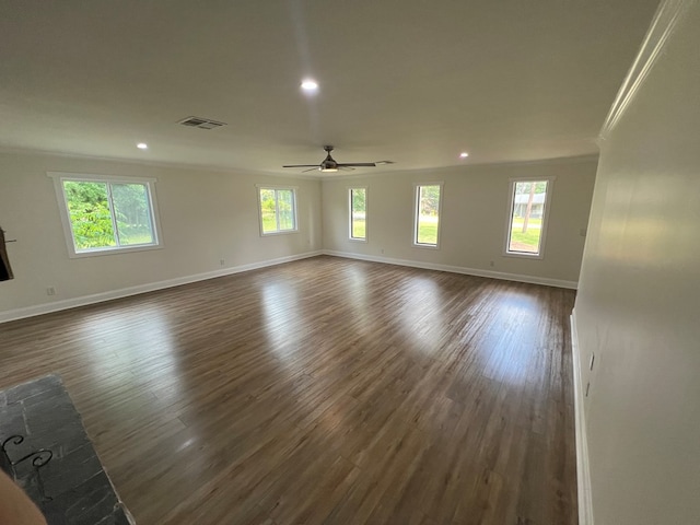315 Newton Dr, Adel, GA 31620 - empty room with a ceiling fan, baseboards, dark wood-style floors, and recessed lighting
