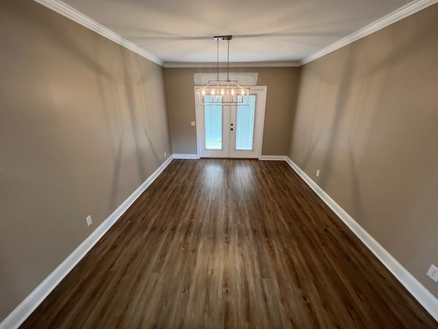 315 Newton Dr, Adel, GA 31620 - unfurnished dining area with baseboards, french doors, dark wood-style floors, and ornamental molding