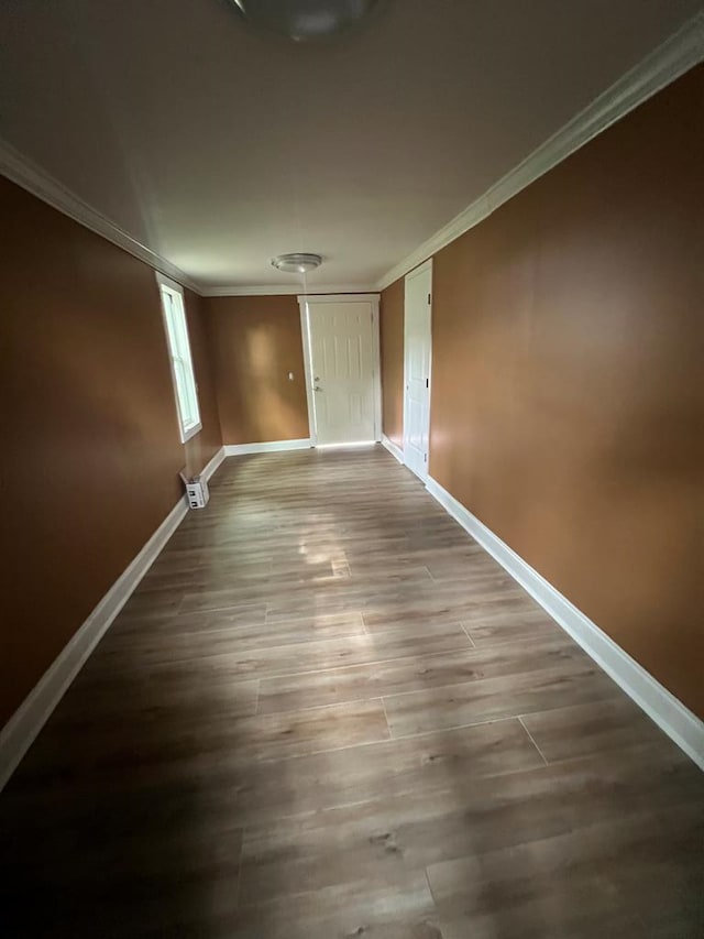 315 Newton Dr, Adel, GA 31620 - corridor featuring ornamental molding, baseboards, and wood finished floors