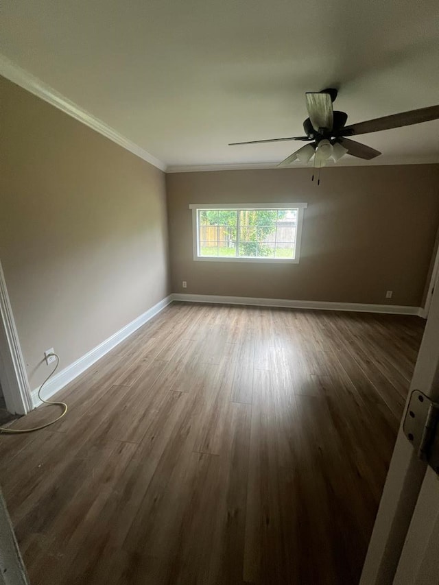 315 Newton Dr, Adel, GA 31620 - unfurnished room featuring wood finished floors, baseboards, ornamental molding, and ceiling fan
