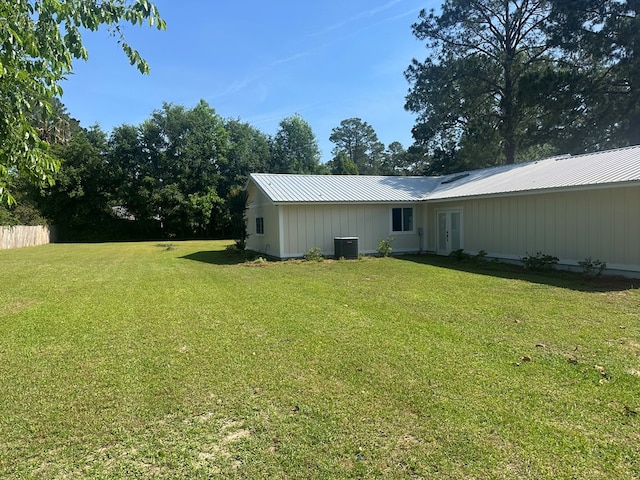 315 Newton Dr, Adel, GA 31620 - rear view of property featuring central AC, french doors, and metal roof