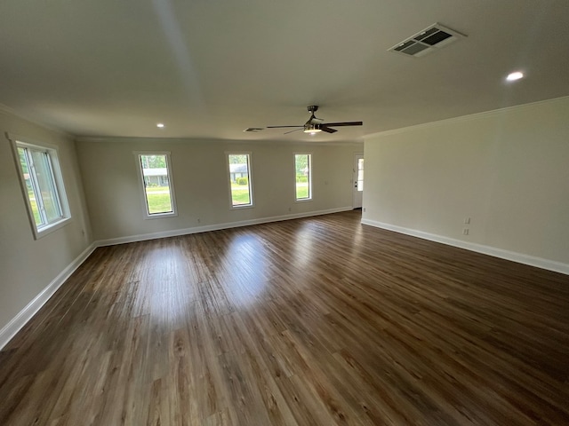 315 Newton Dr, Adel, GA 31620 - spare room featuring baseboards, a ceiling fan, dark wood-type flooring, ornamental molding, and recessed lighting