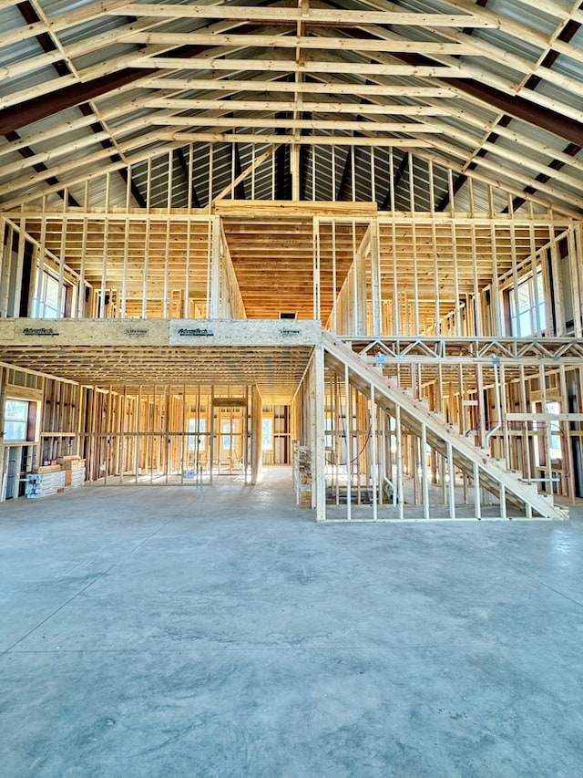 misc room featuring vaulted ceiling and a healthy amount of sunlight