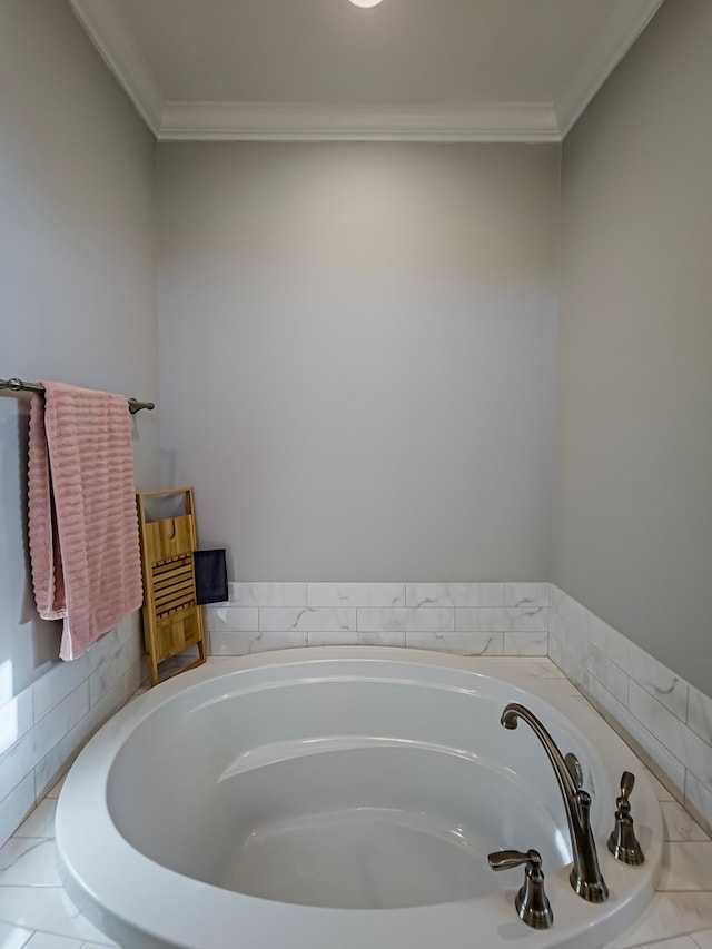 bathroom featuring a bath and ornamental molding
