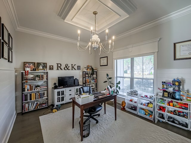 home office with an inviting chandelier, wood finished floors, crown molding, and a wainscoted wall