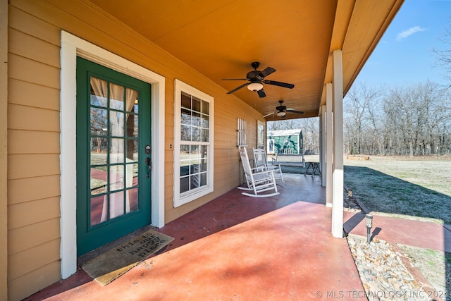 view of patio featuring a porch and ceiling fan