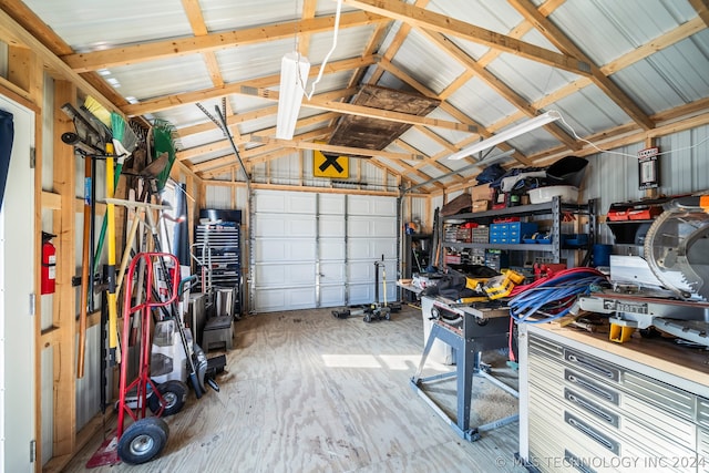 garage with a workshop area