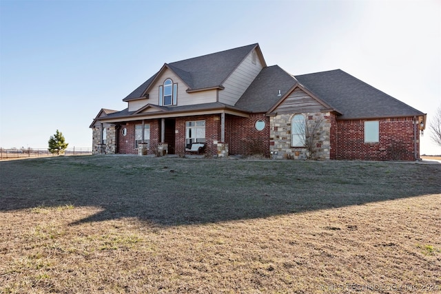 view of front of home with a front yard