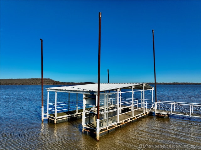 view of dock with a water view