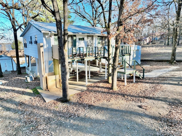 exterior space featuring a wooden deck