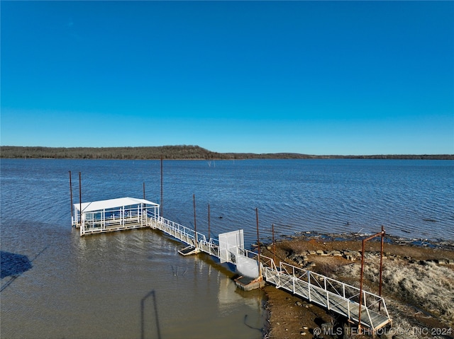 view of dock with a water view