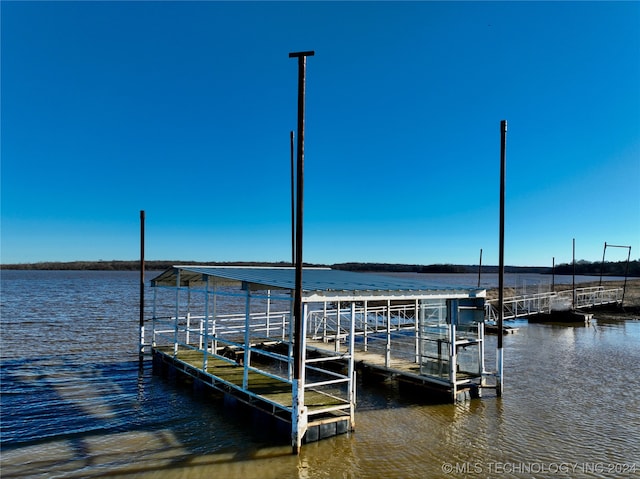 view of dock with a water view